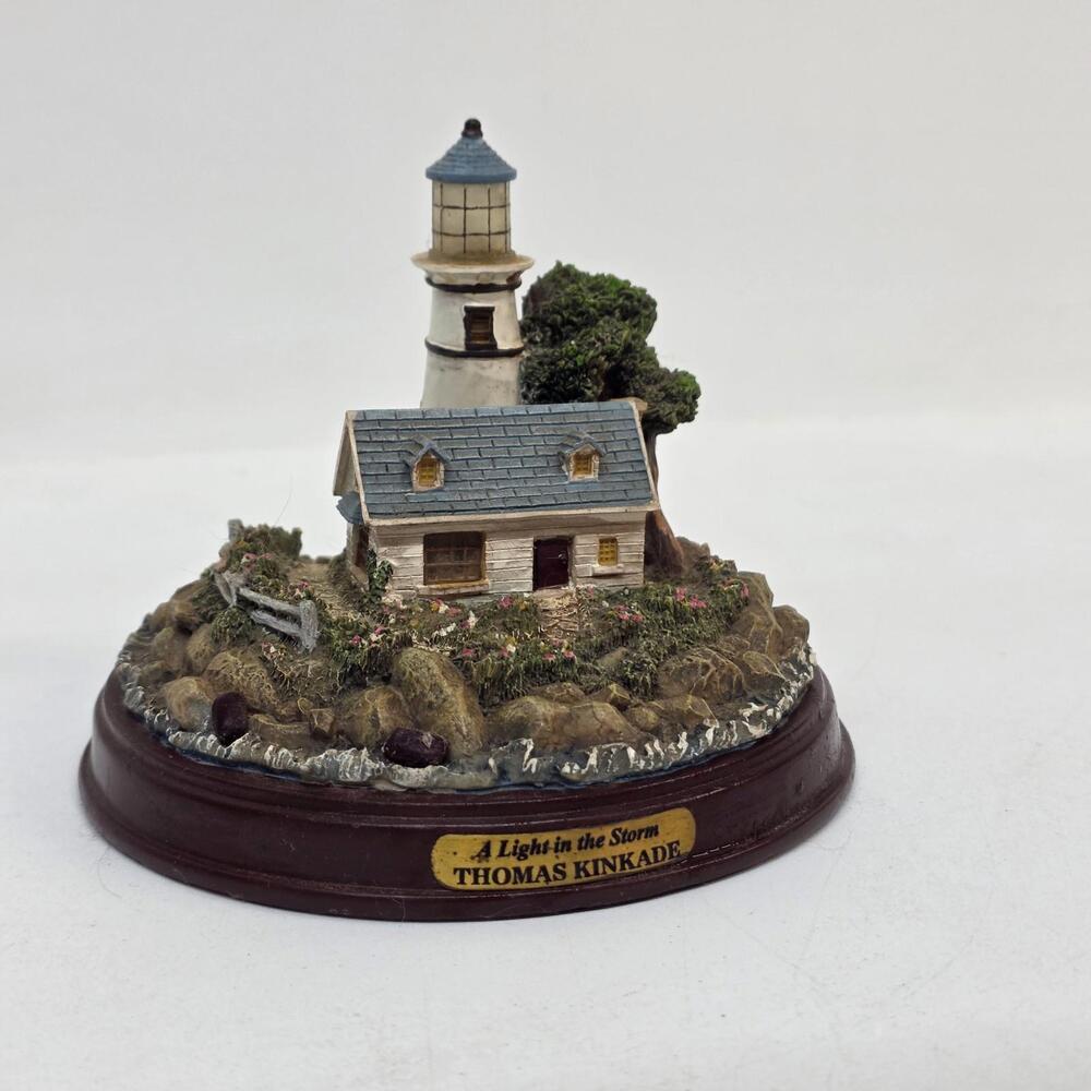 Thomas Kinkade A Light in the Storm Lighthouse Figurine with Light-Up Feature